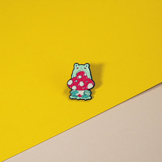 Whimsical Frog on Mushroom Enamel Pin – Unique and Fun Accessory with Leaf Detail for Jackets, Bags, and Collectibles